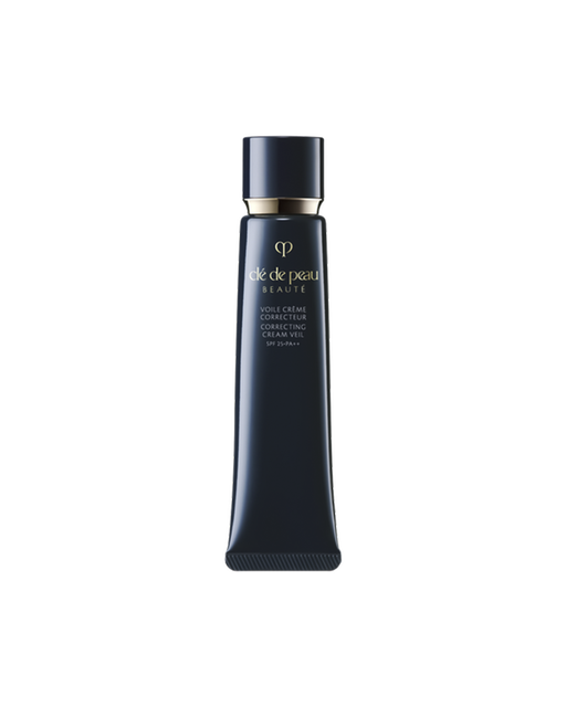 Photo of the "CORRECTING CREAM VEIL" in a glossy deep navy slender tube adorned with a gold logo and cap.