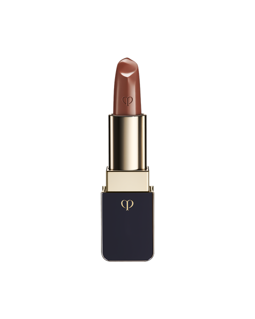 Photo of "LIPSTICK" with the stick twisted up. The tip is engraved with the brand logo, and the body features a combination of blue-black and gold sides. SHADE: Amberkiss Pansy.