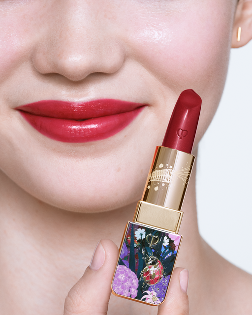 Photo of a light skin tone model wearing LIPSTICK Ruby’s Spark on the lips.