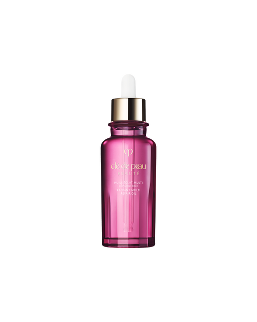 Photo of "RADIANT MULTI REPAIR OIL" in a metallic pink bottle with a white cap and the gold brand logo. Comes with a dropper. Size: 75mL