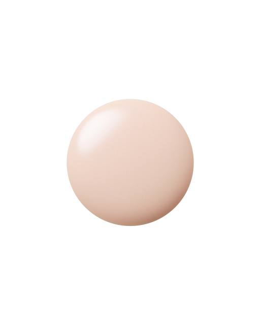 Photo of a glossy beige-pink spherical texture.