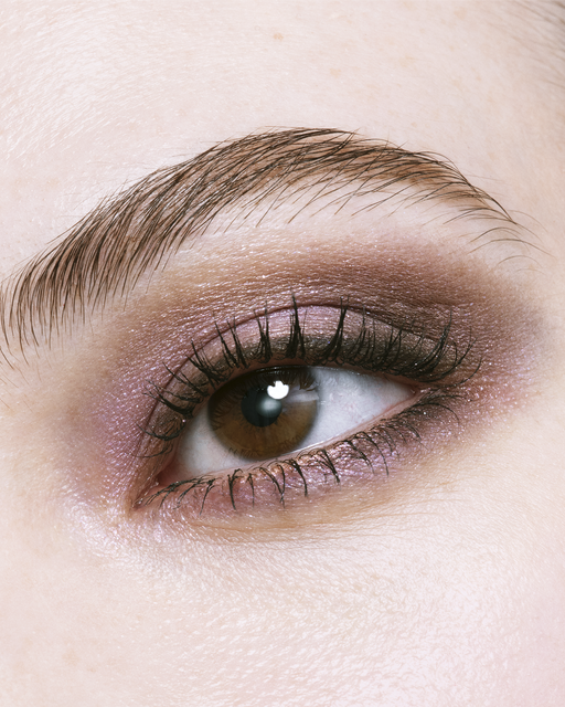 Photo of a light skin tone model  wearing EYE COLOR QUAD in Pastel Tea Safari on the eyes.