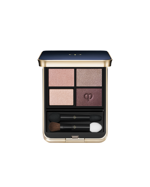 Photo of "EYE COLOR QUAD (REFILL)" set in a square case with a blue-black top and gold brand logo. Includes tip and brush. Shade: 3-Sundried Driftwood.