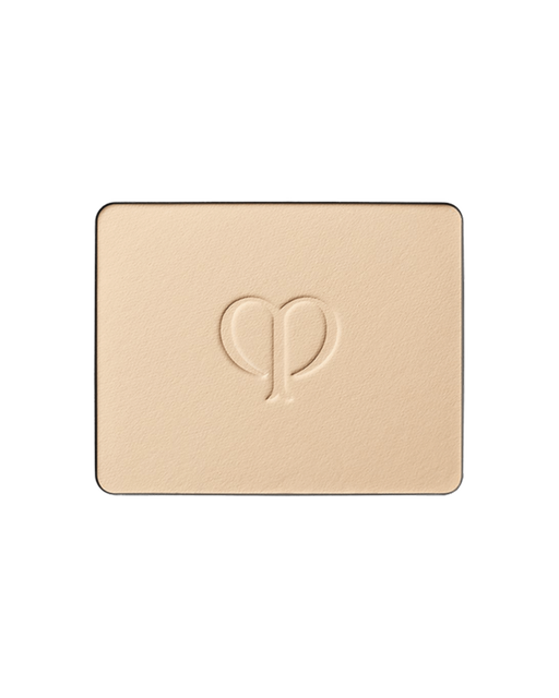 Photo of a refill of "BRIGHTENING POWDER FOUNDATION" with an embossed brand logo in the center. SHADE: I10.