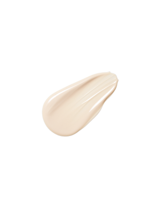 Photo of the creamy texture spreading smoothly, melting into the skin with a moist sheen.