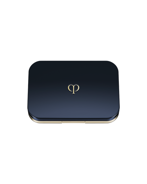 Photo of the exterior of a sleek navy compact case with the brand logo in the center.