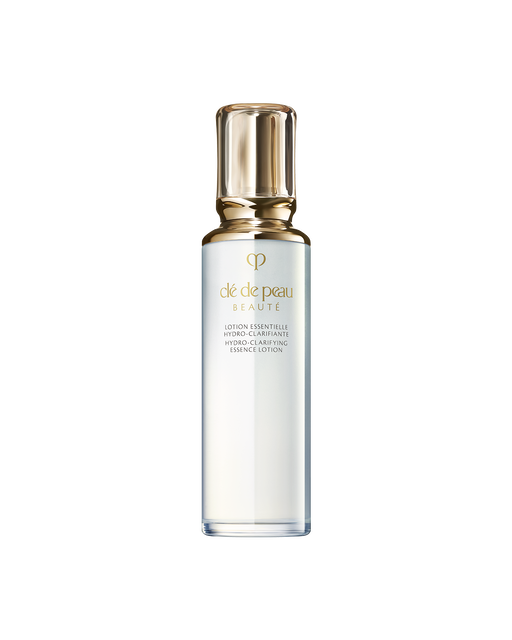 Photo of HYDRO-CLARIFYING ESSENCE LOTION in a clear glass bottle with a rounded, translucent gold cap.SIZE: 170mL.