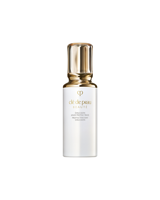 Photo of PROTECTIVE DAY EMULSION in a white glossy bottle with a rounded, translucent gold cap.SIZE: 125mL.