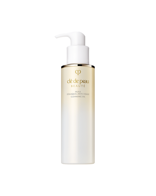 Photo of “CLEANSING OIL” in a bottle with a gradient from gold to white. Features a white pump and the gold brand logo on the front. Size: 200mL.