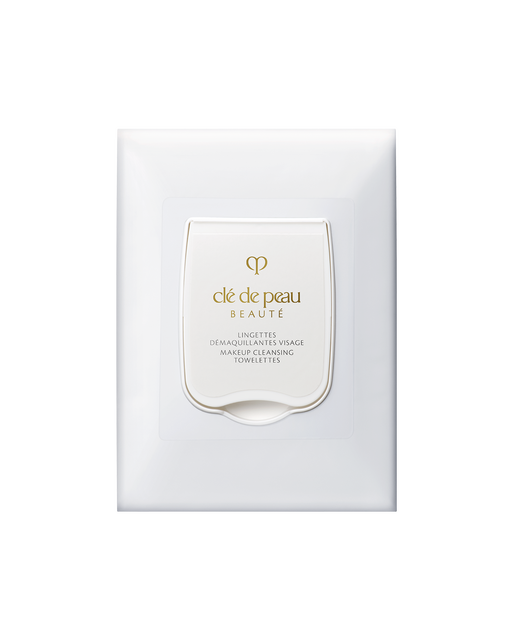 Photo of a white rectangular package of "MAKEUP CLEANSING TOWELETTES" with a curved lid at the center featuring the brand logo and product name in gold.