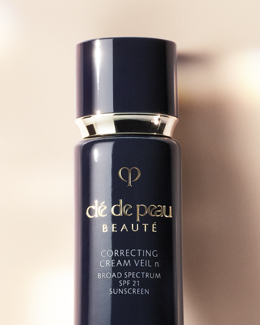 Close-up photo of the brand logo on "CORRECTING CREAM VEIL."