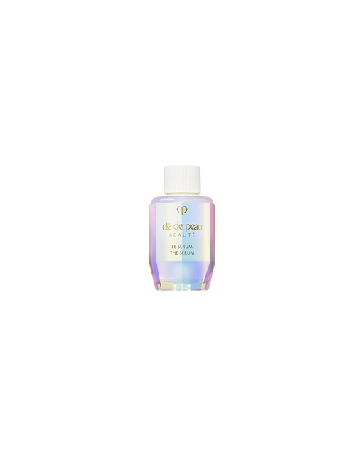 Photo of a refill bottle of THE SERUM, featuring an iridescent, aurora-inspired design with a white cap attached. SIZE: 30ml (refill)