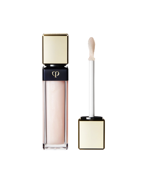 Photo of "RADIANT LIP GLOSS" with a gold cap and slim, clear body. The cap comes with a stick with a tip attached. SHADE: 1 Rose Quartz.