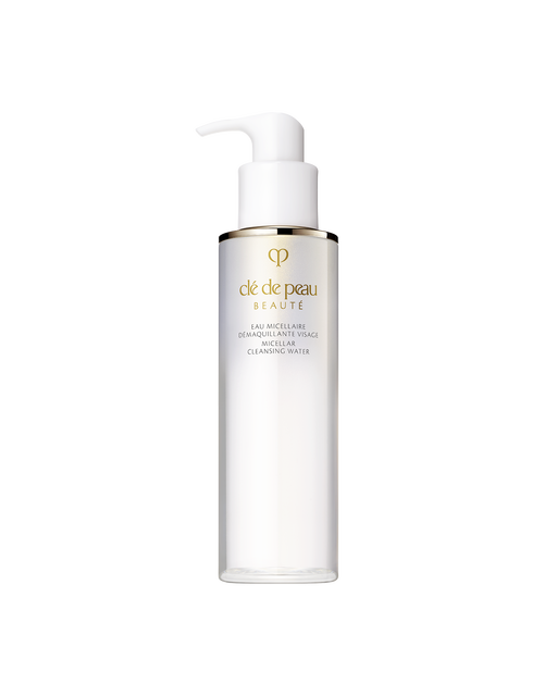 Photo of a translucent white pump bottle of "MICELLAR CLEANSING WATER" with elegant gold accents. SIZE: 200ML