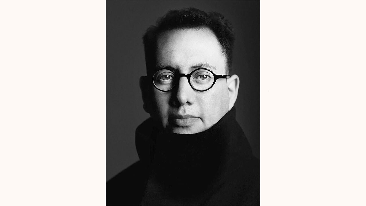 Photo of Refik Anadol in a black-and-white portrait.
