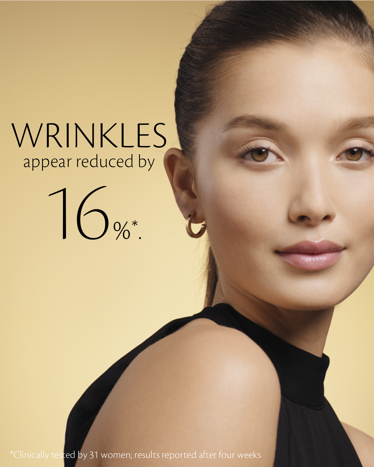Photo of a woman with smooth skin against a golden background. On the left, text reads: “WRINKLES appear reduced by 16%*.” A note at the bottom states: “*Clinically tested by 31 women; results reported after four weeks.”
