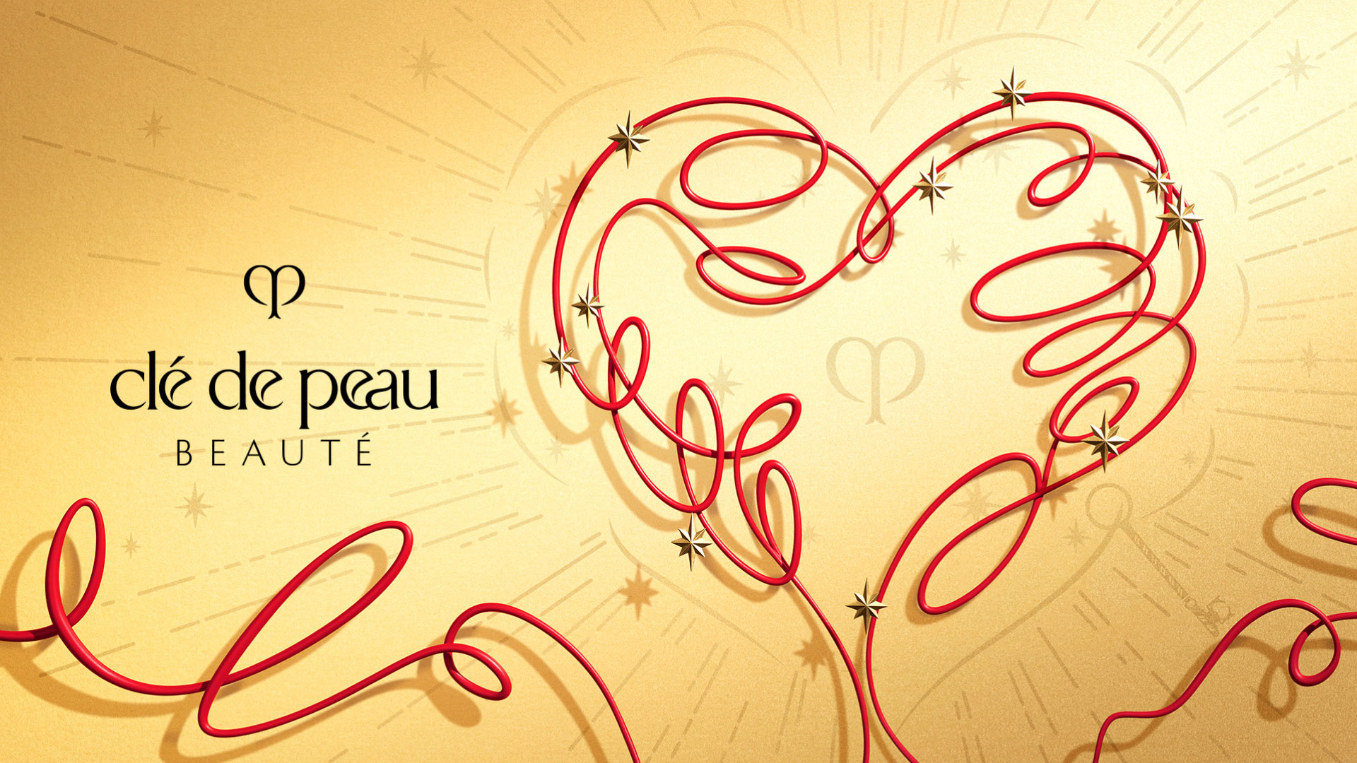 Wallpaper of the Clé de Peau Beauté logo with a heart design made of a red ribbon.
