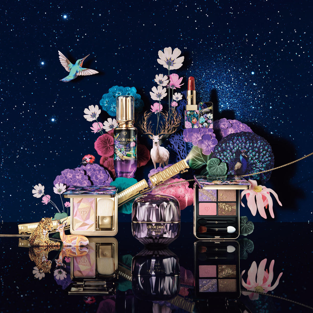 Photo of limited-edition products from the HOLIDAY 2025 collection, arranged under a starry night sky, surrounded by illustrated animals such as a white deer, a peacock, and a leopard, along with colorful flowers.