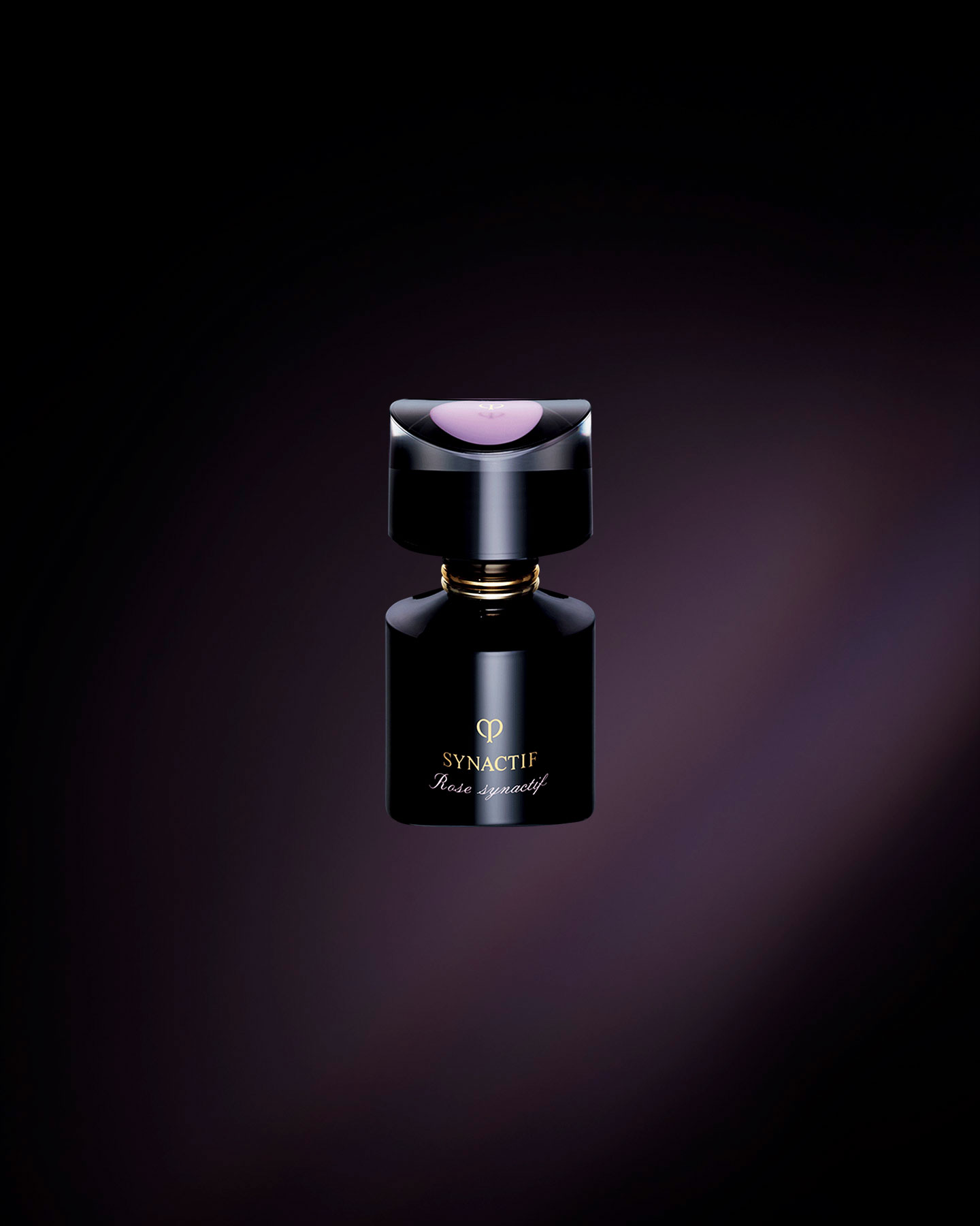 Photo of the Clé de Peau Beauté SYNACTIF EAU DE PARFUM, ROSE SYNACTIF. The fragrance is housed in a lustrous, jet-black bottle featuring the 'SYNACTIF' logo. The top of the cap is adorned with the brand logo, revealing a lavender color.
